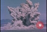 Image of underground atom bomb testing dust cloud Nevada United States USA , 1958, second 28 stock footage video 65675078695