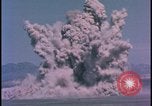 Image of underground atom bomb testing dust cloud Nevada United States USA , 1958, second 29 stock footage video 65675078695