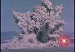 Image of underground atom bomb testing dust cloud Nevada United States USA , 1958, second 30 stock footage video 65675078695