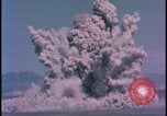 Image of underground atom bomb testing dust cloud Nevada United States USA , 1958, second 31 stock footage video 65675078695