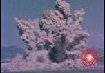 Image of underground atom bomb testing dust cloud Nevada United States USA , 1958, second 32 stock footage video 65675078695