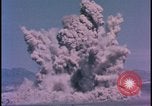 Image of underground atom bomb testing dust cloud Nevada United States USA , 1958, second 33 stock footage video 65675078695