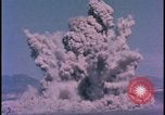 Image of underground atom bomb testing dust cloud Nevada United States USA , 1958, second 34 stock footage video 65675078695