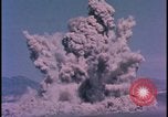 Image of underground atom bomb testing dust cloud Nevada United States USA , 1958, second 35 stock footage video 65675078695