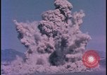 Image of underground atom bomb testing dust cloud Nevada United States USA , 1958, second 37 stock footage video 65675078695