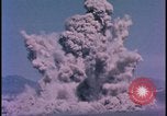 Image of underground atom bomb testing dust cloud Nevada United States USA , 1958, second 38 stock footage video 65675078695