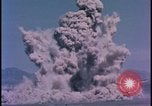 Image of underground atom bomb testing dust cloud Nevada United States USA , 1958, second 39 stock footage video 65675078695