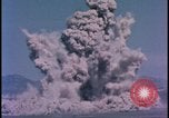 Image of underground atom bomb testing dust cloud Nevada United States USA , 1958, second 40 stock footage video 65675078695
