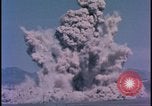 Image of underground atom bomb testing dust cloud Nevada United States USA , 1958, second 41 stock footage video 65675078695