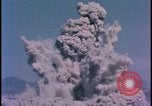 Image of underground atom bomb testing dust cloud Nevada United States USA , 1958, second 42 stock footage video 65675078695