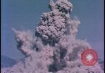Image of underground atom bomb testing dust cloud Nevada United States USA , 1958, second 51 stock footage video 65675078695