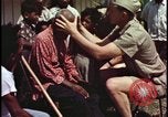 Image of fallout victims examined Bikini Atoll Marshall Islands, 1954, second 14 stock footage video 65675078698