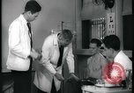Image of physical examination United States USA, 1937, second 22 stock footage video 65675078712