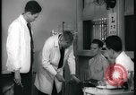Image of physical examination United States USA, 1937, second 23 stock footage video 65675078712