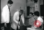 Image of physical examination United States USA, 1937, second 25 stock footage video 65675078712