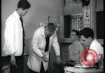 Image of physical examination United States USA, 1937, second 33 stock footage video 65675078712