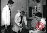 Image of physical examination United States USA, 1937, second 34 stock footage video 65675078712