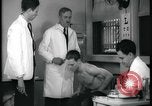 Image of physical examination United States USA, 1937, second 42 stock footage video 65675078712