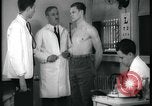 Image of physical examination United States USA, 1937, second 49 stock footage video 65675078712