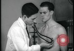 Image of physical examination United States USA, 1937, second 53 stock footage video 65675078712