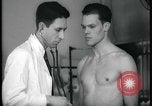 Image of physical examination United States USA, 1937, second 54 stock footage video 65675078712