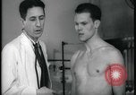Image of physical examination United States USA, 1937, second 56 stock footage video 65675078712