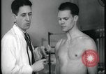 Image of physical examination United States USA, 1937, second 57 stock footage video 65675078712