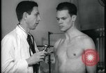 Image of physical examination United States USA, 1937, second 58 stock footage video 65675078712