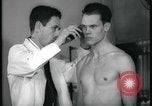 Image of physical examination United States USA, 1937, second 60 stock footage video 65675078712