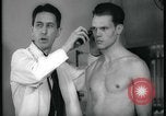Image of physical examination United States USA, 1937, second 62 stock footage video 65675078712
