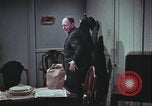 Image of police arrest United States USA, 1964, second 57 stock footage video 65675078747