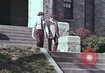 Image of police car rural road United States USA, 1964, second 13 stock footage video 65675078748