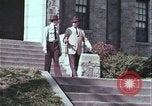 Image of police car rural road United States USA, 1964, second 14 stock footage video 65675078748