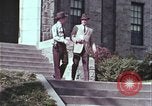 Image of police car rural road United States USA, 1964, second 15 stock footage video 65675078748