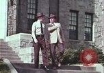 Image of police car rural road United States USA, 1964, second 18 stock footage video 65675078748