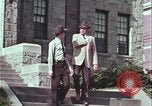 Image of police car rural road United States USA, 1964, second 19 stock footage video 65675078748