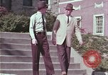 Image of police car rural road United States USA, 1964, second 24 stock footage video 65675078748