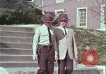 Image of police car rural road United States USA, 1964, second 26 stock footage video 65675078748