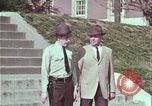 Image of police car rural road United States USA, 1964, second 28 stock footage video 65675078748