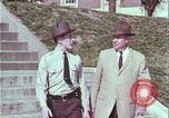 Image of police car rural road United States USA, 1964, second 30 stock footage video 65675078748