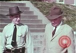 Image of police car rural road United States USA, 1964, second 33 stock footage video 65675078748