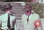 Image of police car rural road United States USA, 1964, second 34 stock footage video 65675078748