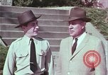 Image of police car rural road United States USA, 1964, second 35 stock footage video 65675078748