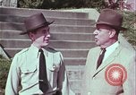 Image of police car rural road United States USA, 1964, second 36 stock footage video 65675078748