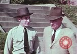 Image of police car rural road United States USA, 1964, second 37 stock footage video 65675078748