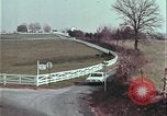 Image of police car rural road United States USA, 1964, second 56 stock footage video 65675078748