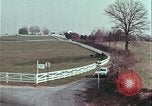 Image of police car rural road United States USA, 1964, second 57 stock footage video 65675078748
