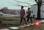 Image of police car rural road United States USA, 1964, second 60 stock footage video 65675078748