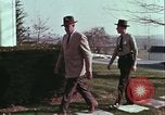 Image of police car rural road United States USA, 1964, second 62 stock footage video 65675078748