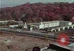 Image of criminals arrested motel stakeout United States USA, 1964, second 15 stock footage video 65675078749